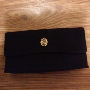 Small Black Evening Bag 8 1/2" Long x 4 1/2" High GOld PIece On Front Used, Old.